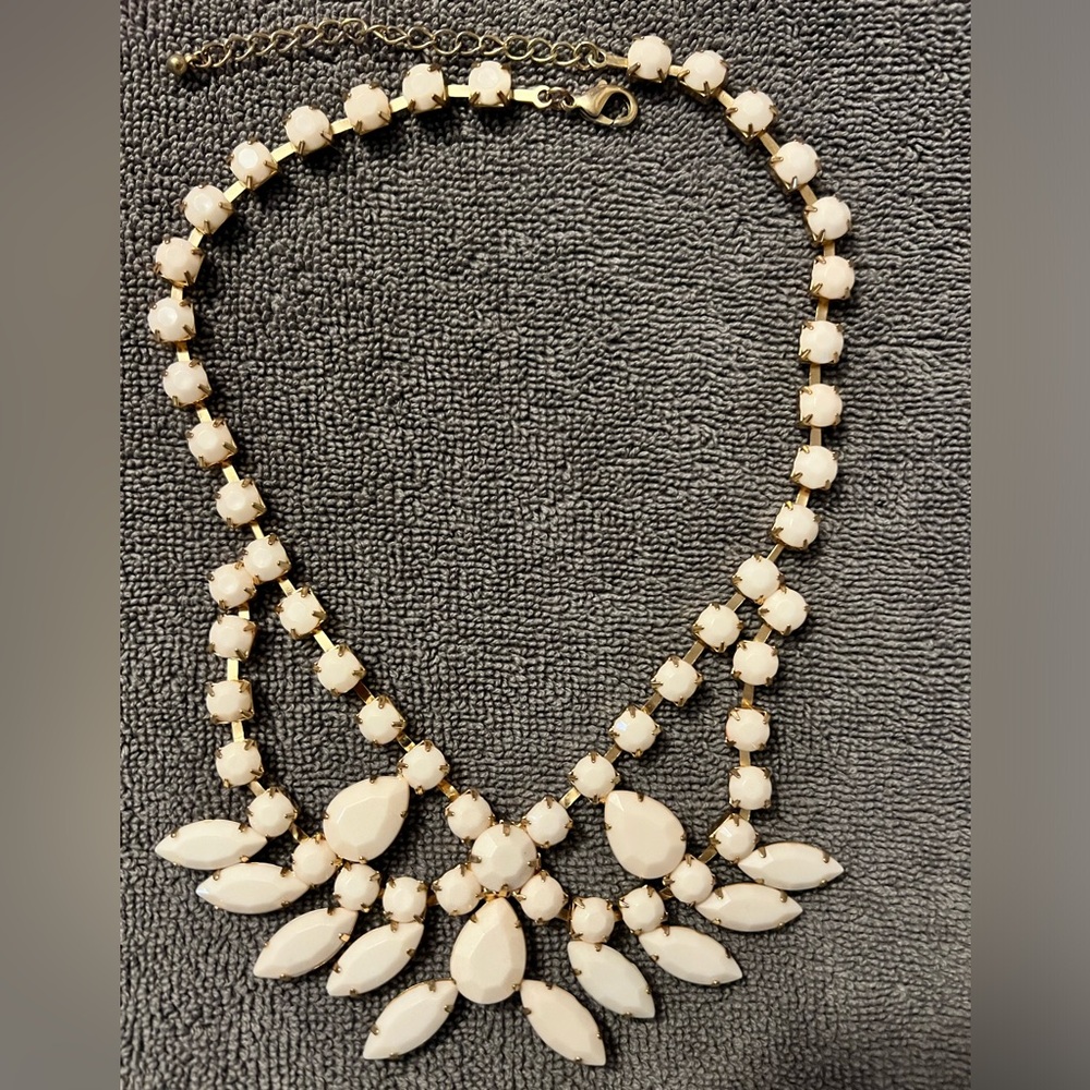 Women’s light pink and gold jeweled necklace